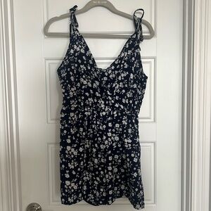 Navy with white floral pattern romper